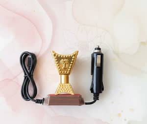 Car electric bakhoor incense burner by Spark hand with gold decorative top and cigarette lighter plug