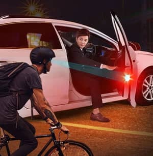 Spark hand car LED door warning light showing bright red warning LED light bar on open car door to alert cyclist